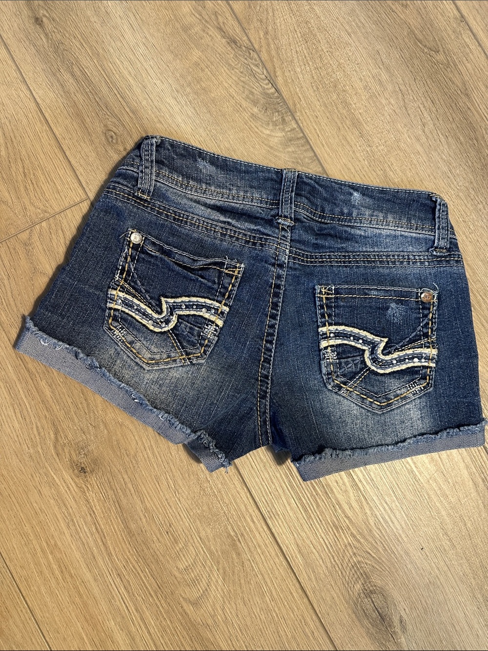 Wallflower Blue Rolled Cuff Denim Shorts. Mid rise. Rhinestones on pockets. 3